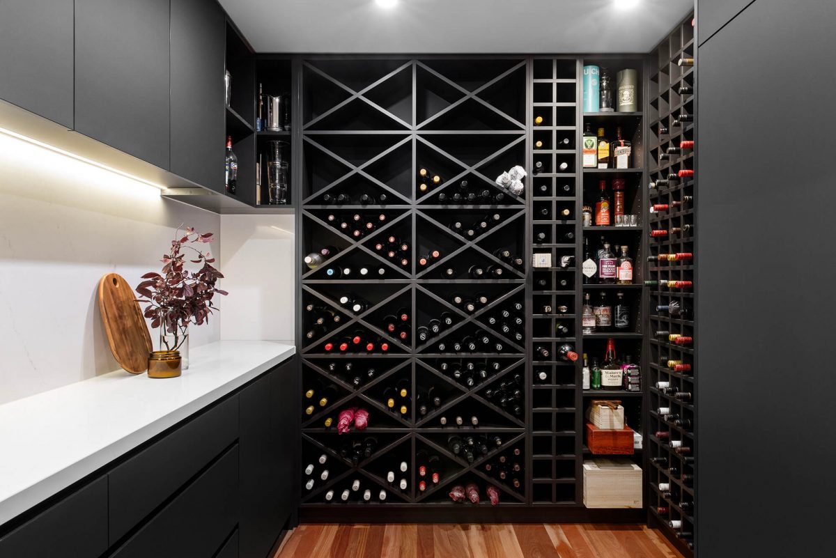 A custom designed pantry featuring a monochromatic design and butlers wine cellar. Designed and built by MJ Harris Group. #MJHxGrandviewGr