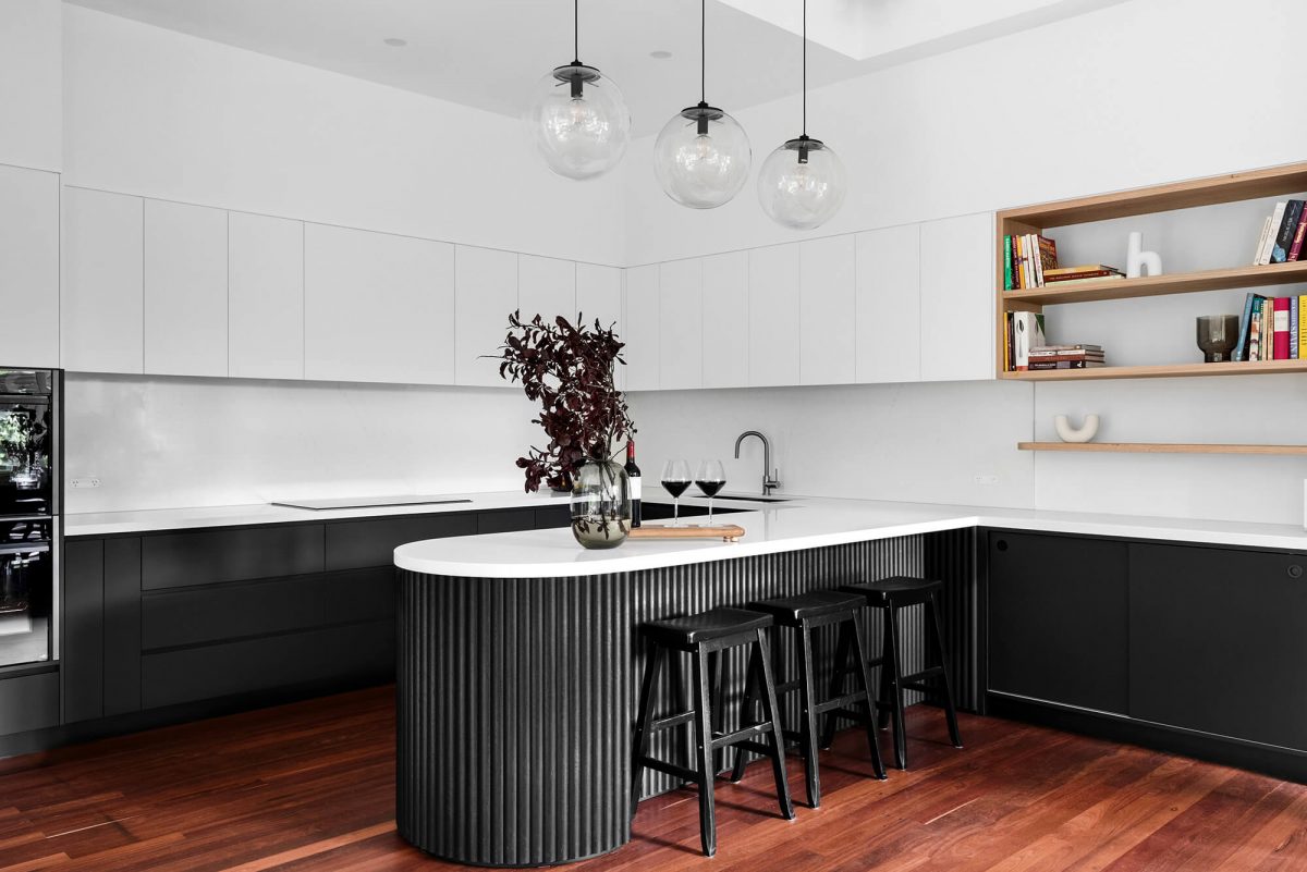 A custom designed kitchen featuring a monochromatic curved island bench. Designed and built by MJ Harris Group. #MJHxGrandviewGr