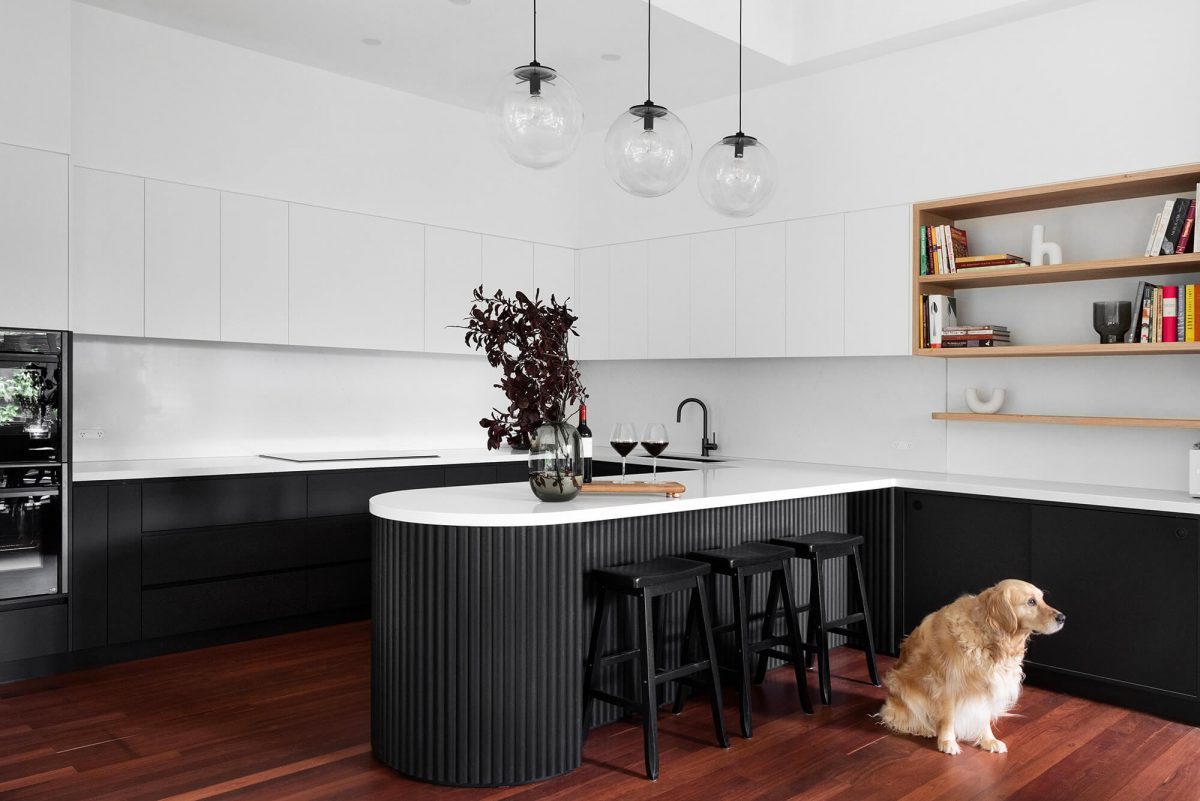 A custom designed kitchen featuring a monochromatic curved island bench. Designed and built by MJ Harris Group. #MJHxGrandviewGr