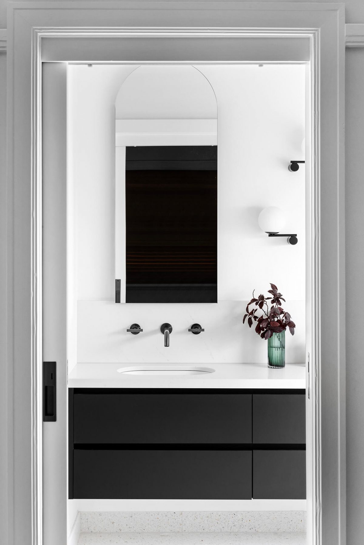 A custom designed bathroom featuring gunmetal fixtures. Designed and built by MJ Harris Group. #MJHxGrandviewGr