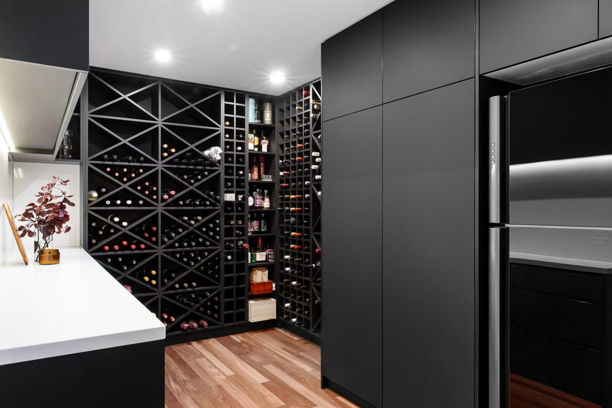 A custom designed pantry featuring a monochromatic design and butlers wine cellar. Designed and built by MJ Harris Group. #MJHxGrandviewGr