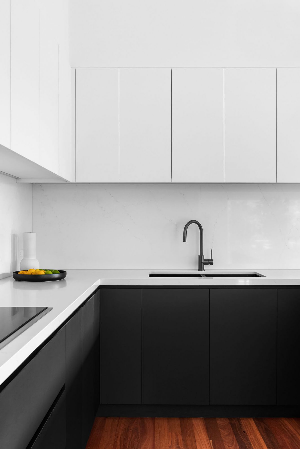 A custom designed kitchen featuring a monochromatic design. Designed and built by MJ Harris Group. #MJHxGrandviewGr