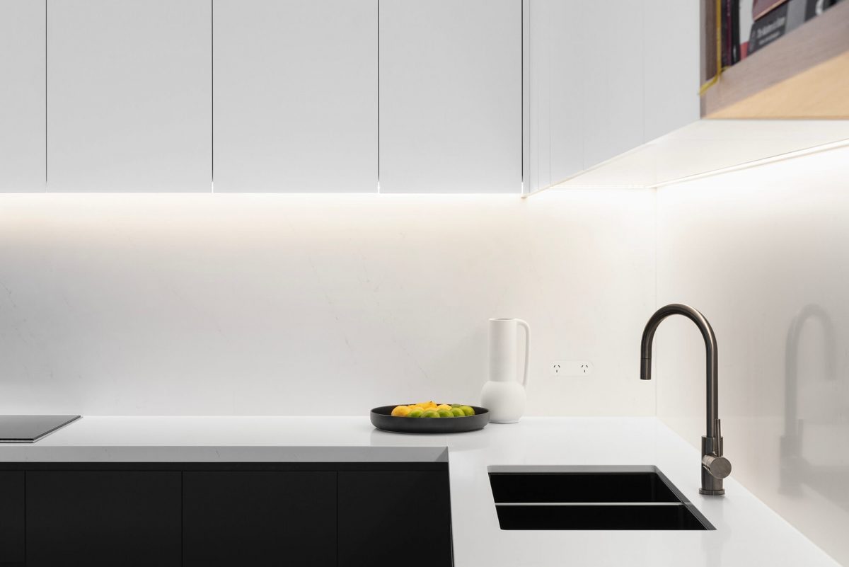 A custom designed kitchen featuring gunmetal fixtures. Designed and built by MJ Harris Group. #MJHxGrandviewGr