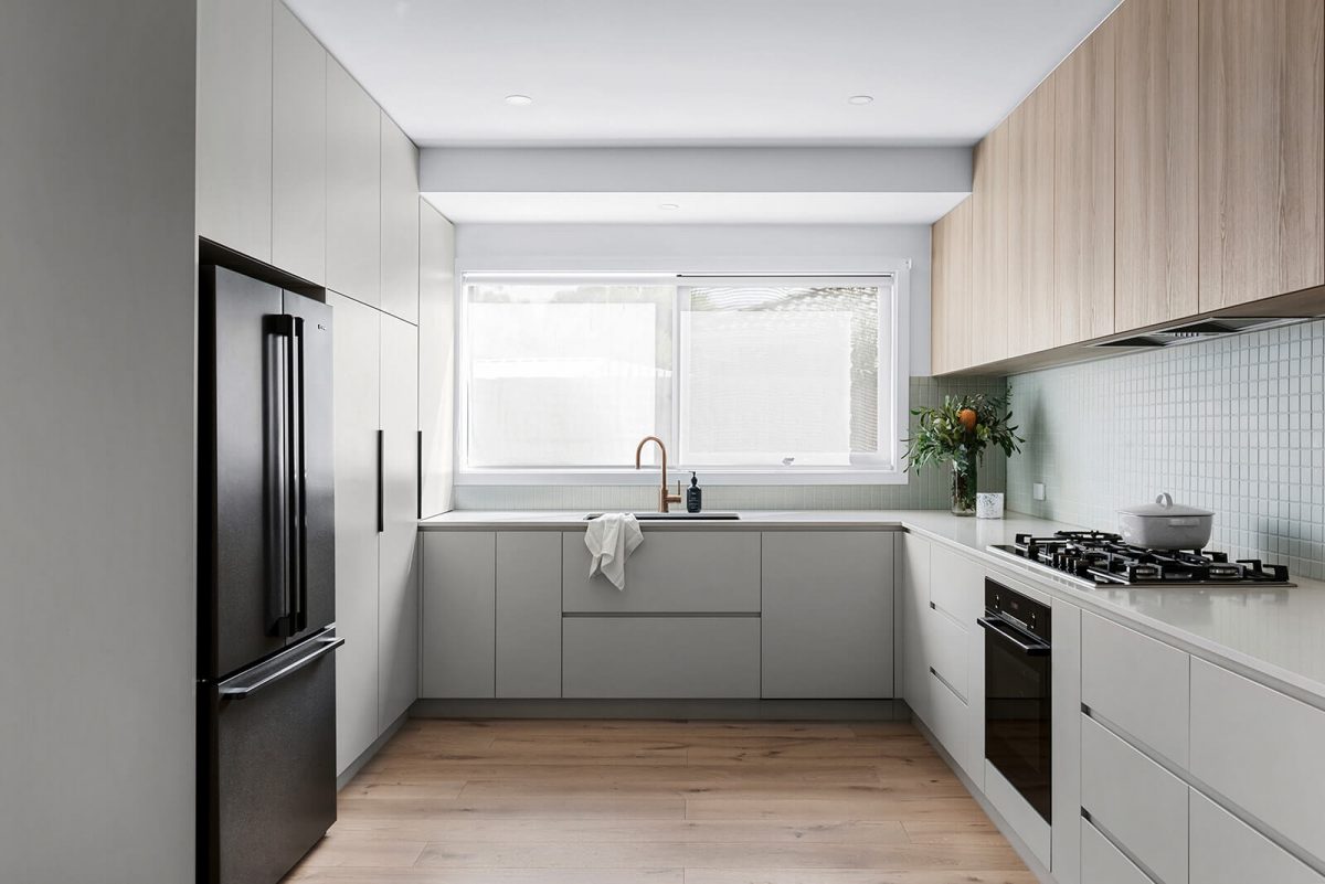 A custom designed kitchen featuring a green tile. Designed and built by MJ Harris Group. #MJHxHeroicCrt