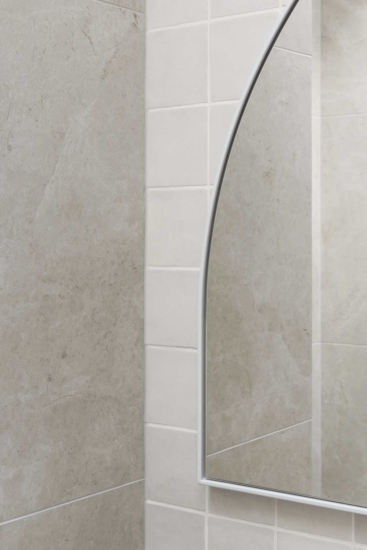 A custom designed bathroom featuring a Melange Bianco tile. Designed and built by MJ Harris Group. #MJHxWallisAve