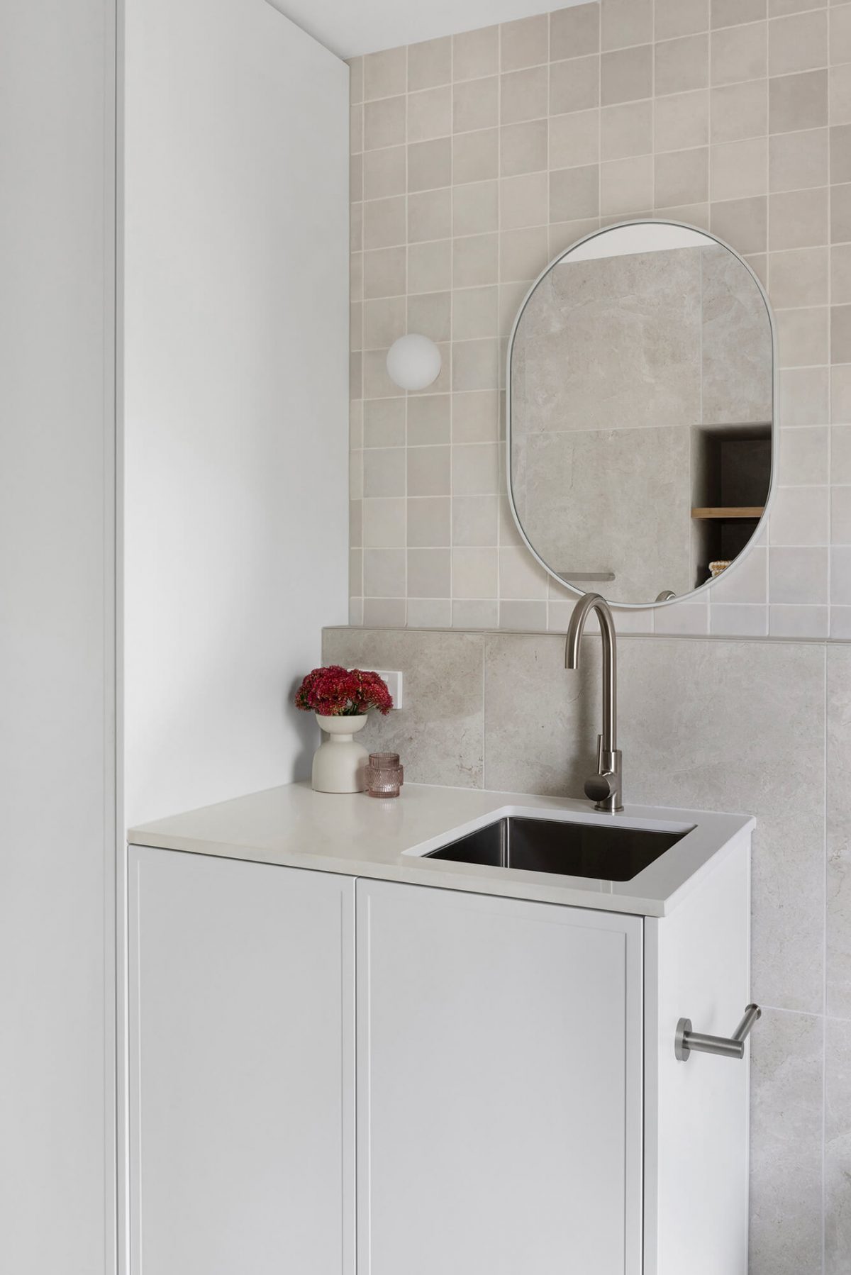 A custom designed bathroom featuring a Melange Bianco tile. Designed and built by MJ Harris Group. #MJHxWallisAve