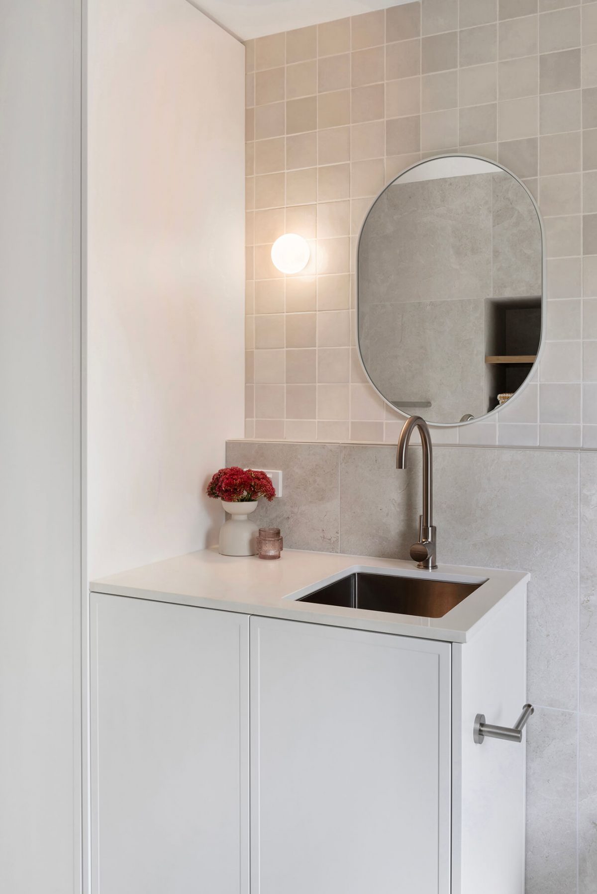 A custom designed bathroom featuring a Melange Bianco tile. Designed and built by MJ Harris Group. #MJHxWallisAve