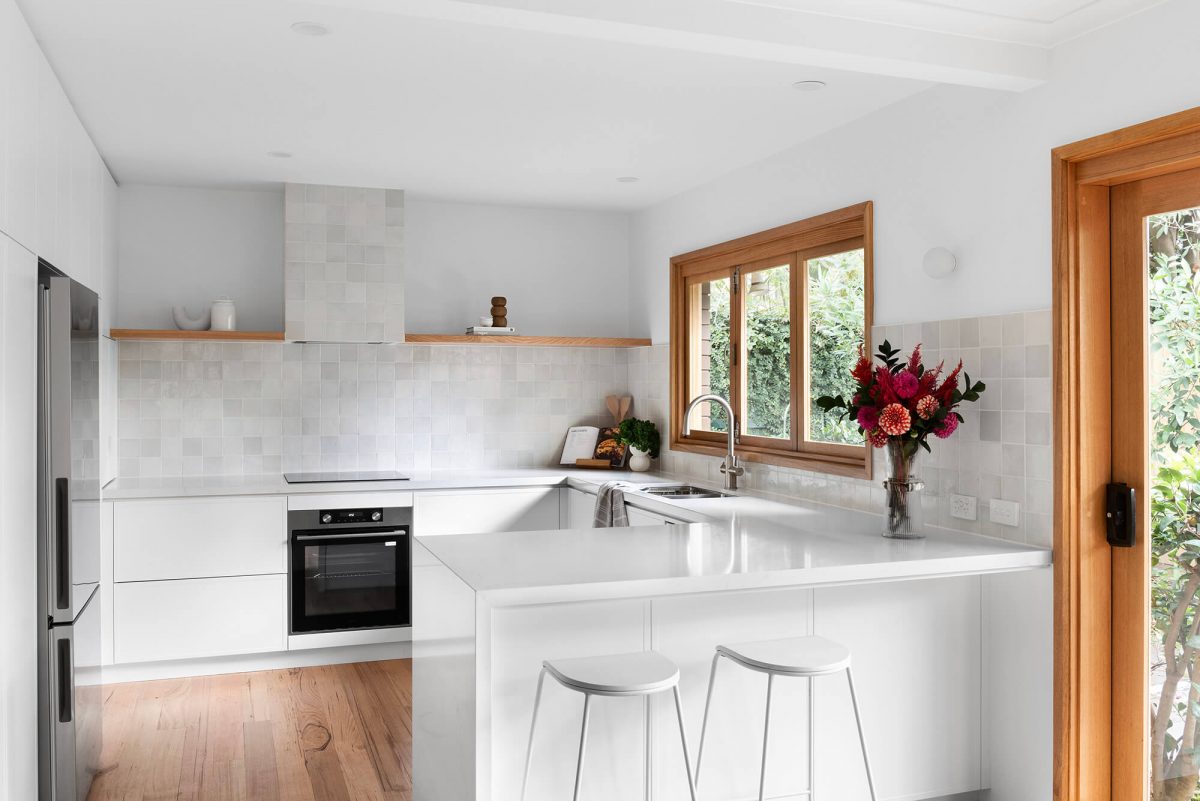 A custom designed kitchen featuring a Melange Bianco tile. Designed and built by MJ Harris Group. #MJHxWallisAve