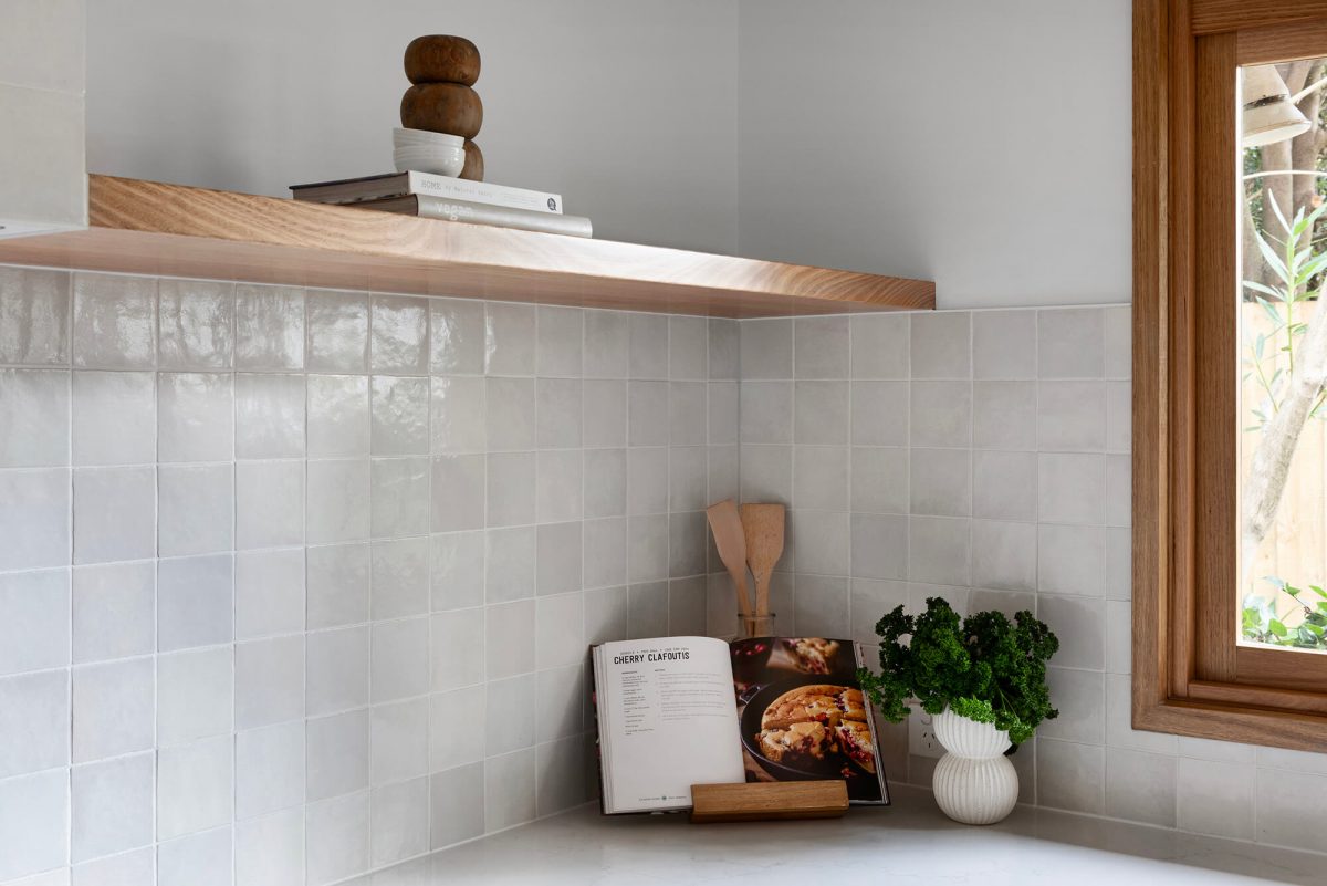 A custom designed kitchen featuring a Melange Bianco tile. Designed and built by MJ Harris Group. #MJHxWallisAve