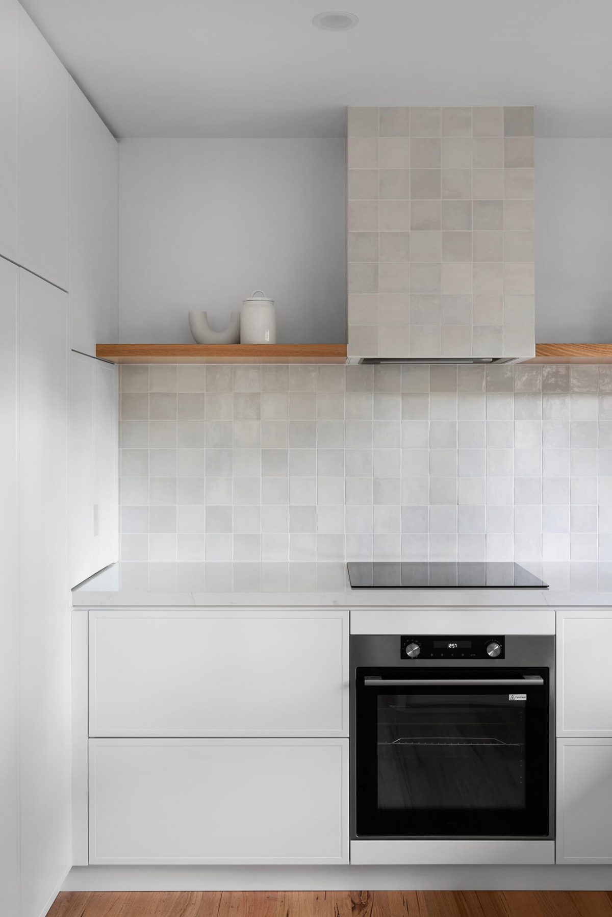 A custom designed kitchen featuring a Melange Bianco tile. Designed and built by MJ Harris Group. #MJHxWallisAve