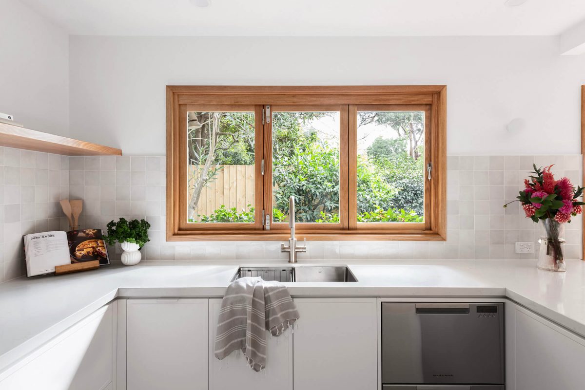 A custom designed kitchen featuring a Melange Bianco tile. Designed and built by MJ Harris Group. #MJHxWallisAve