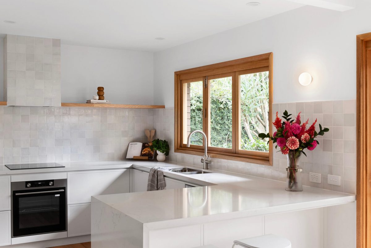 A custom designed kitchen featuring a Melange Bianco tile. Designed and built by MJ Harris Group. #MJHxWallisAve