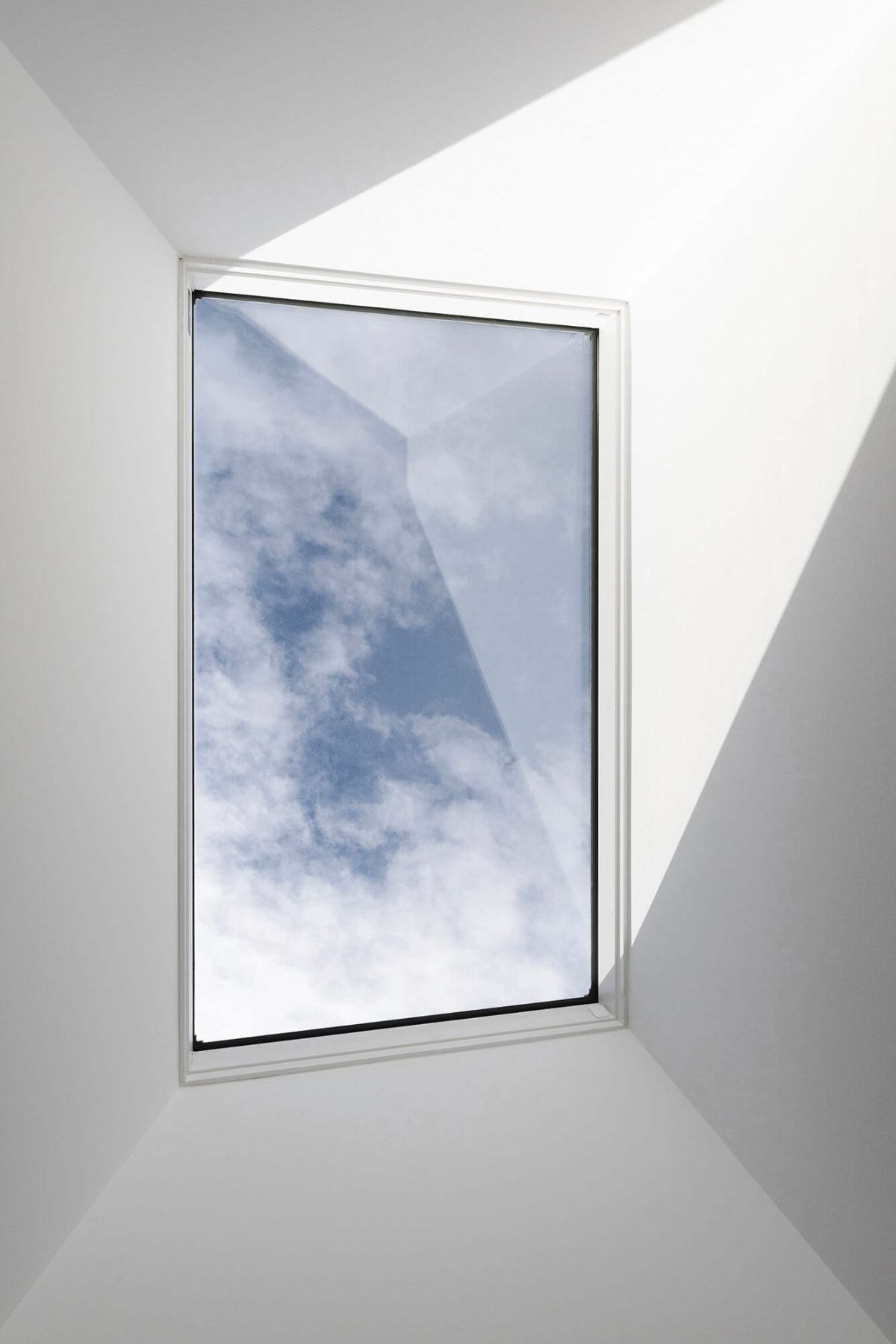 A custom designed bathroom featuring a skylight. Designed and built by MJ Harris Group. #MJHxWallisAve