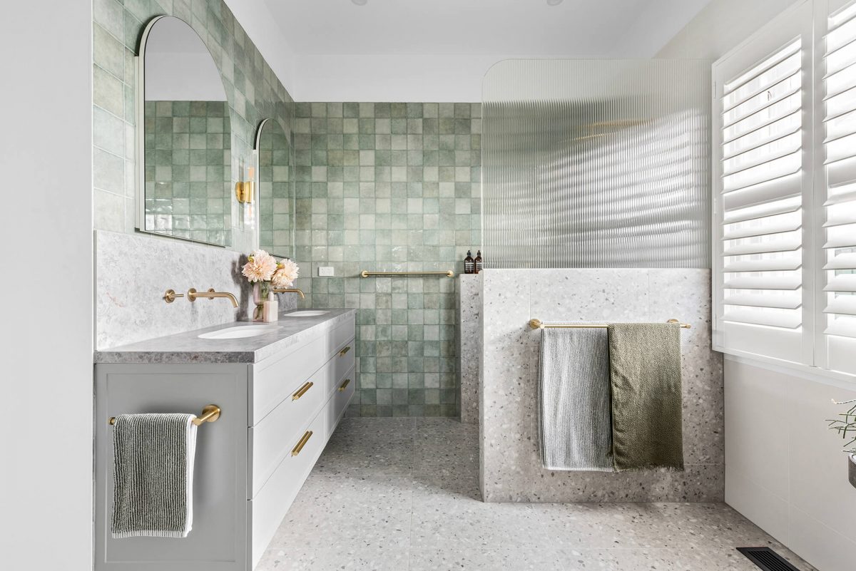 A custom designed bathroom featuring terrazzo tiles. Designed and built by MJ Harris Group. #MJHxOrrrongCt