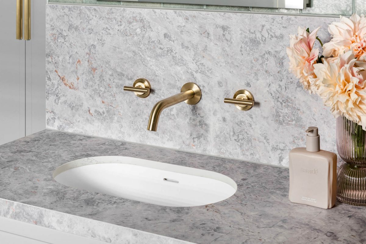 A custom designed bathroom featuring gold hardware. Designed and built by MJ Harris Group. #MJHxOrrrongCt