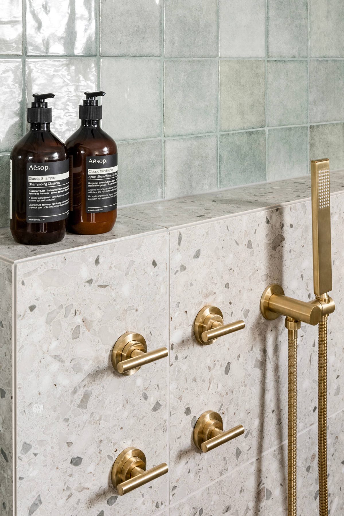A custom designed bathroom featuring terrazzo tiles. Designed and built by MJ Harris Group. #MJHxOrrrongCt