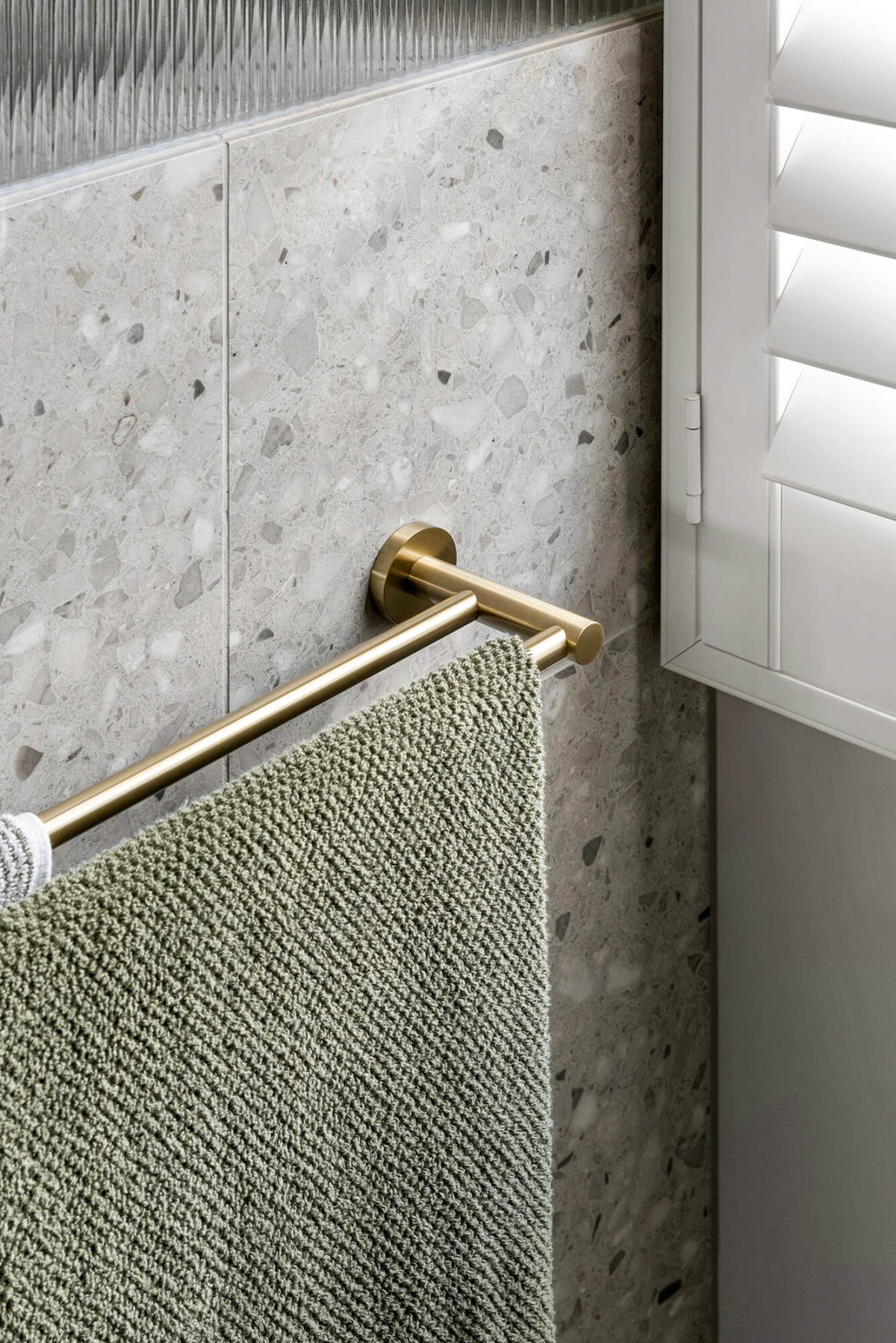 A custom designed bathroom featuring terrazzo tiles. Designed and built by MJ Harris Group. #MJHxOrrrongCt