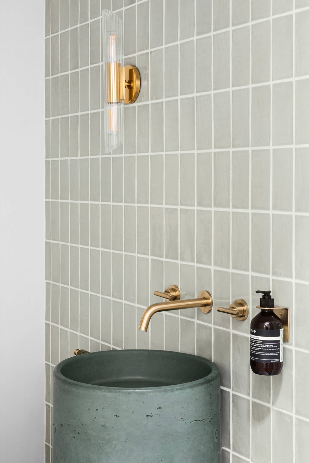A custom designed bathroom featuring a green basin. Designed and built by MJ Harris Group. #MJHxOrrrongCt