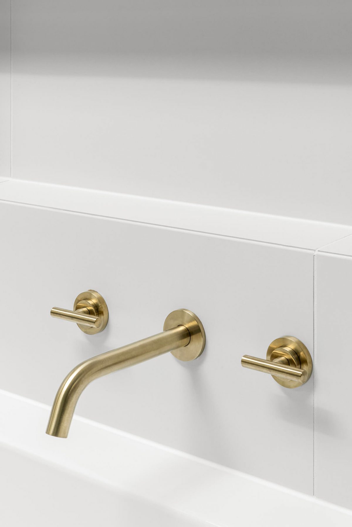 A custom designed bathroom featuring gold hardware. Designed and built by MJ Harris Group. #MJHxOrrrongCt