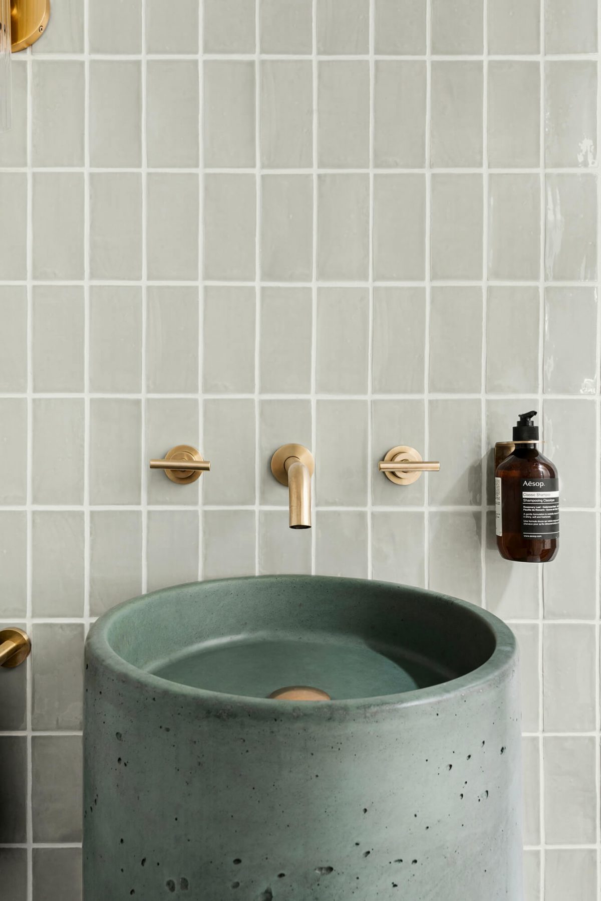 A custom designed bathroom featuring a green basin. Designed and built by MJ Harris Group. #MJHxOrrrongCt
