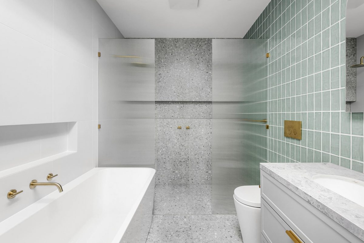 A custom designed bathroom featuring custom joinery. Designed and built by MJ Harris Group. #MJHxOrrrongCt