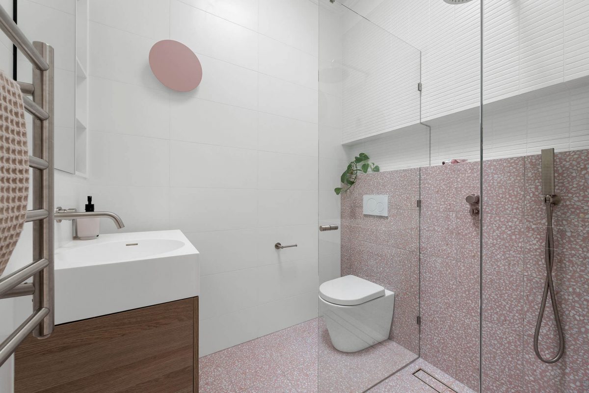 A custom designed bathroom featuring pink tiles. Designed and built by MJ Harris Group. #MJHxKeonSt