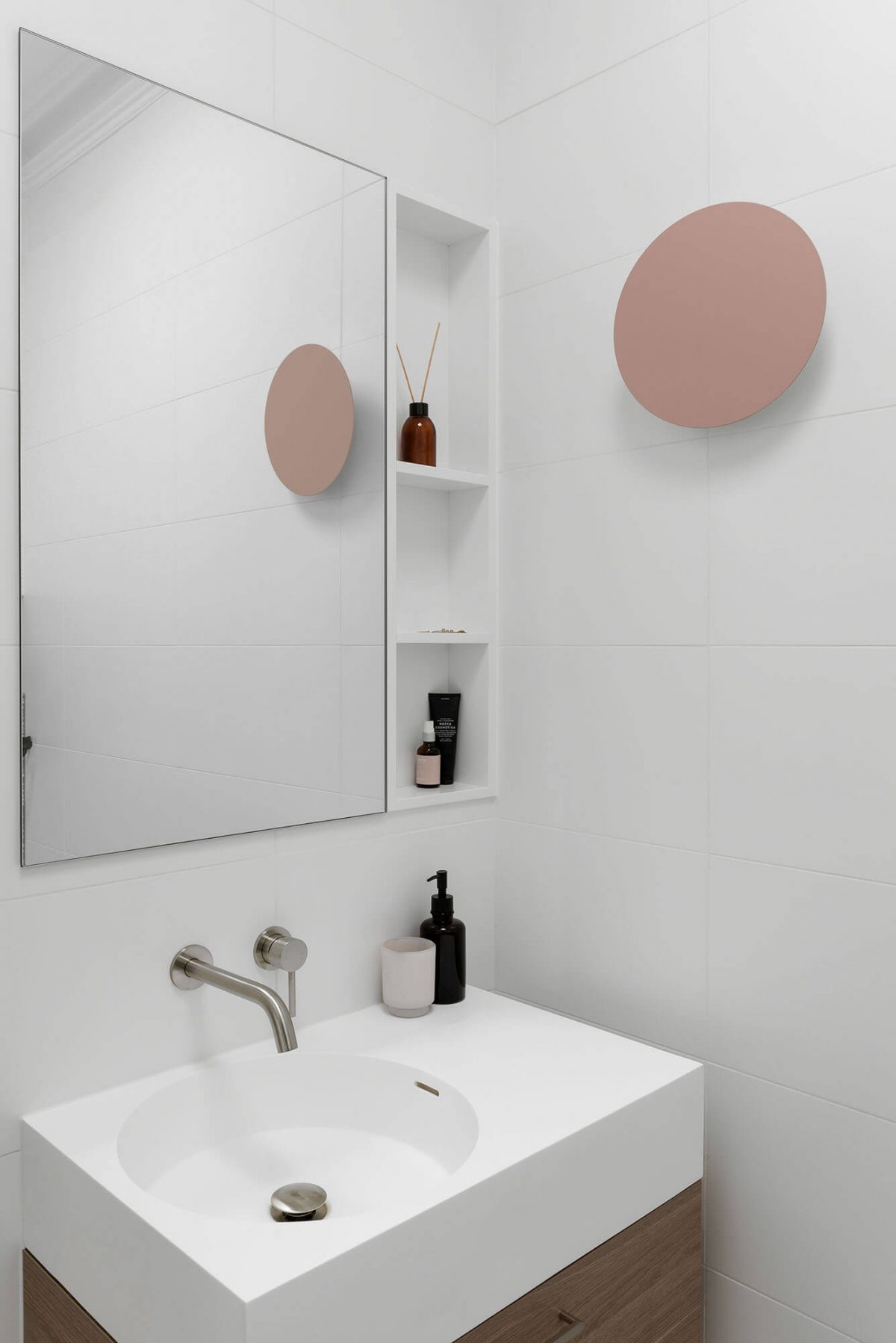 A custom designed bathroom featuring a pink light. Designed and built by MJ Harris Group. #MJHxKeonSt