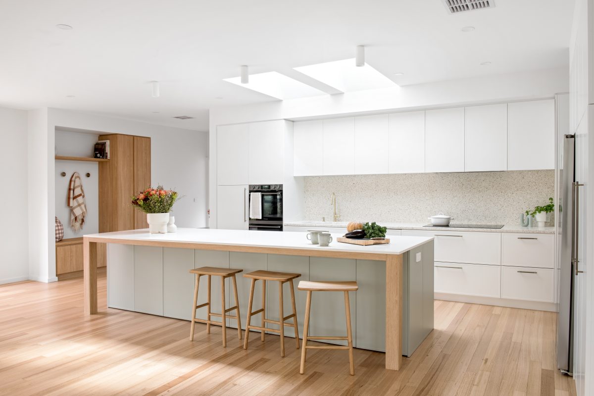 A custom designed kitchen featuring terrazzo benchtops + splashbacks and custom joinery. Designed and built by MJ Harris Group. #MJHxElthamSouth