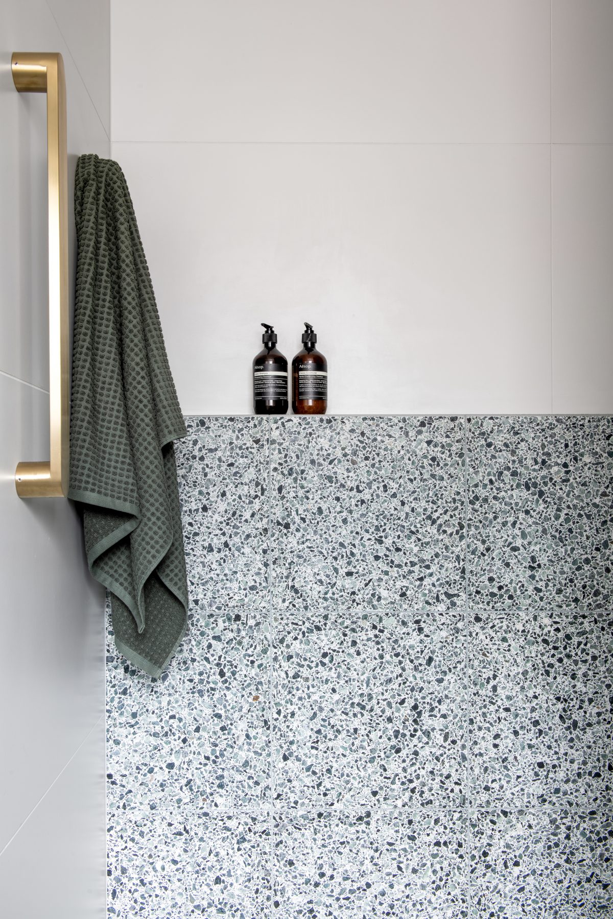 Custom bathroom featuring green terazzo tiles in Eltham. Designed and built by MJ Harris Group. #MJHxElthamSouth