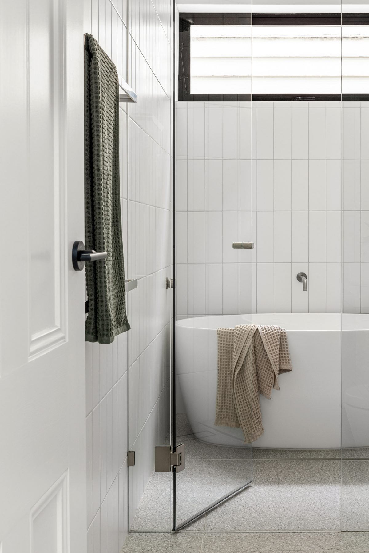 A custom designed bathroom featuring custom joinery. Designed and built by MJ Harris Group. #MJHxAlbionSt