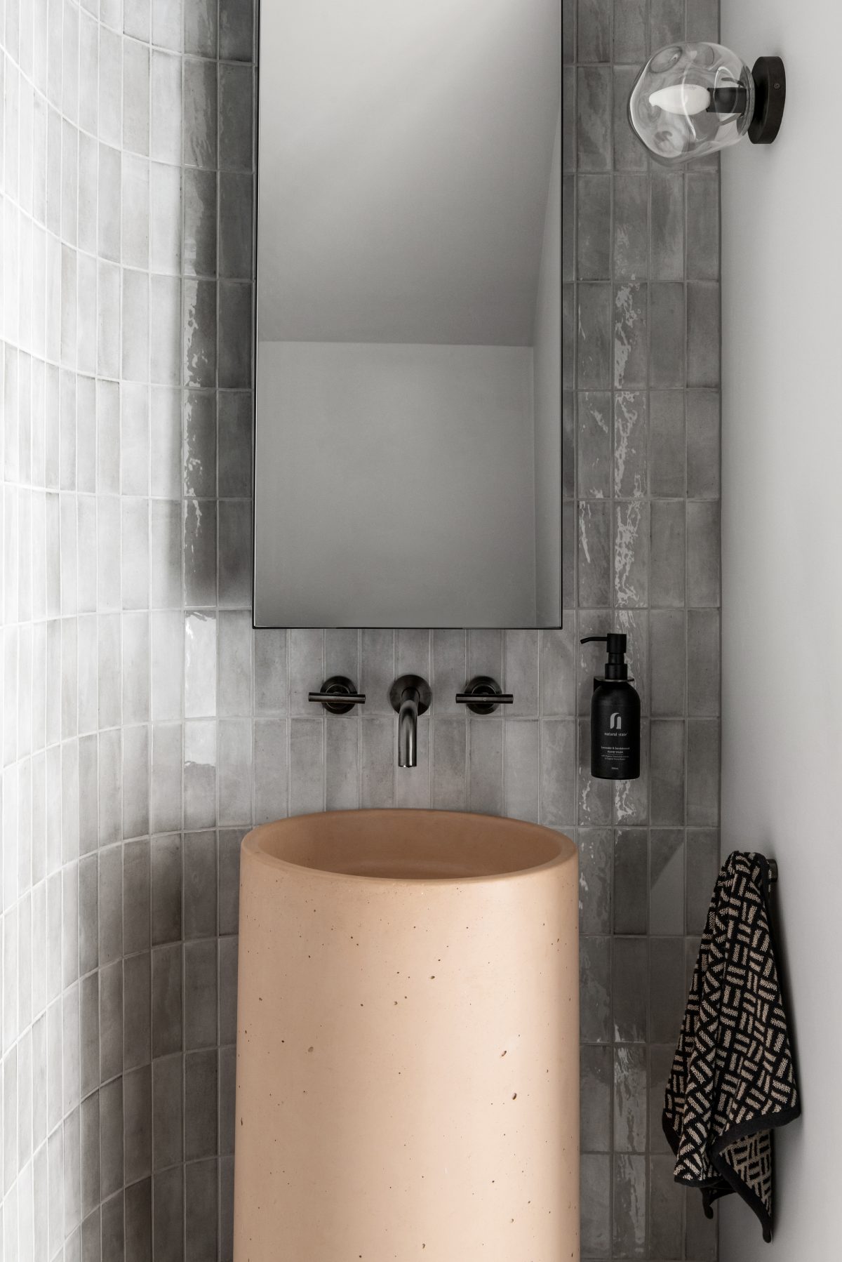 Custom bathroom featuring peach basin designed and built by MJ Harris Group. #MJHxPeppinSt