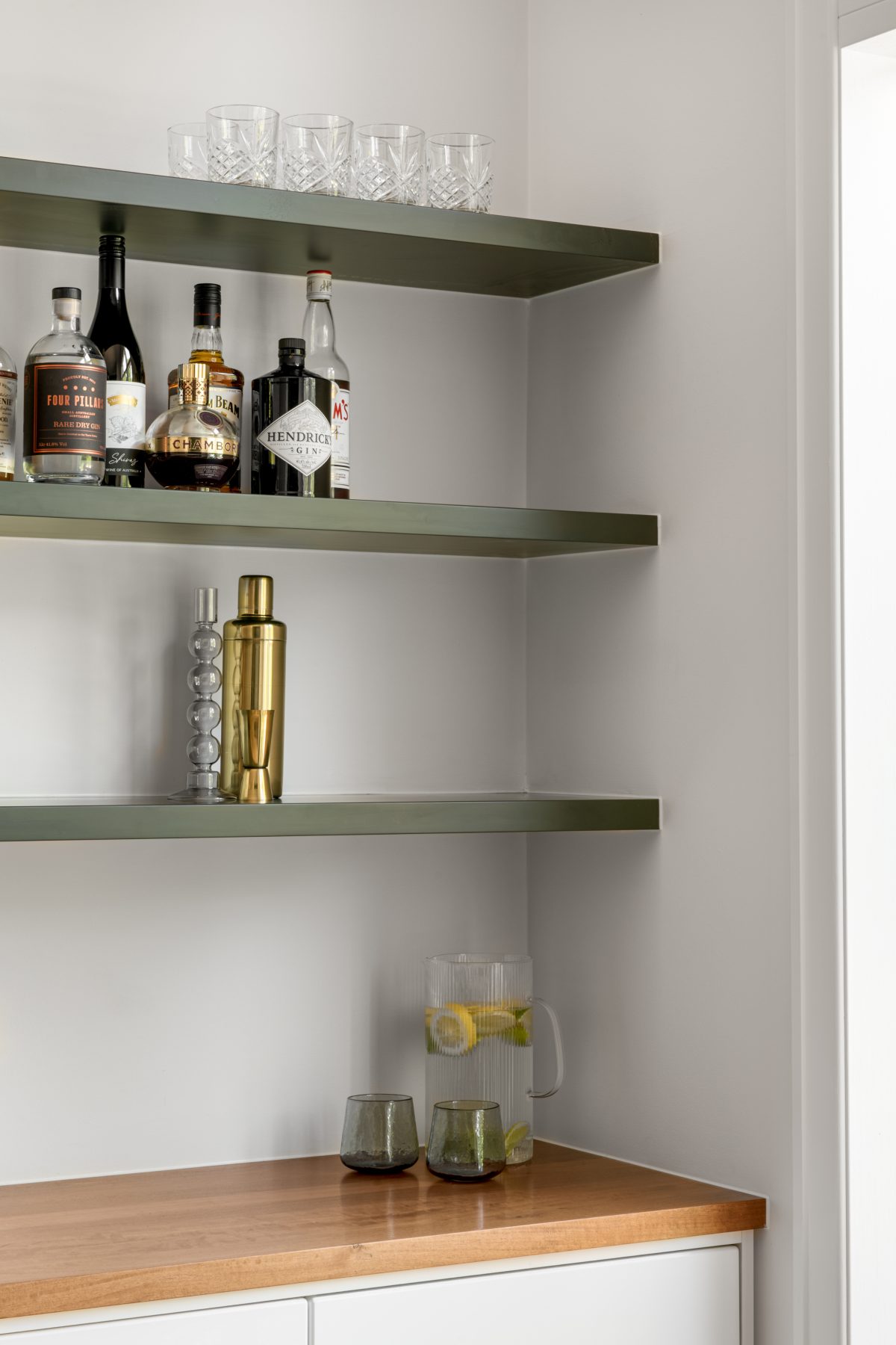 A custom designed living space featuring a custom designed bar. Designed and built by MJ Harris Group. #MJHxEmpressRd