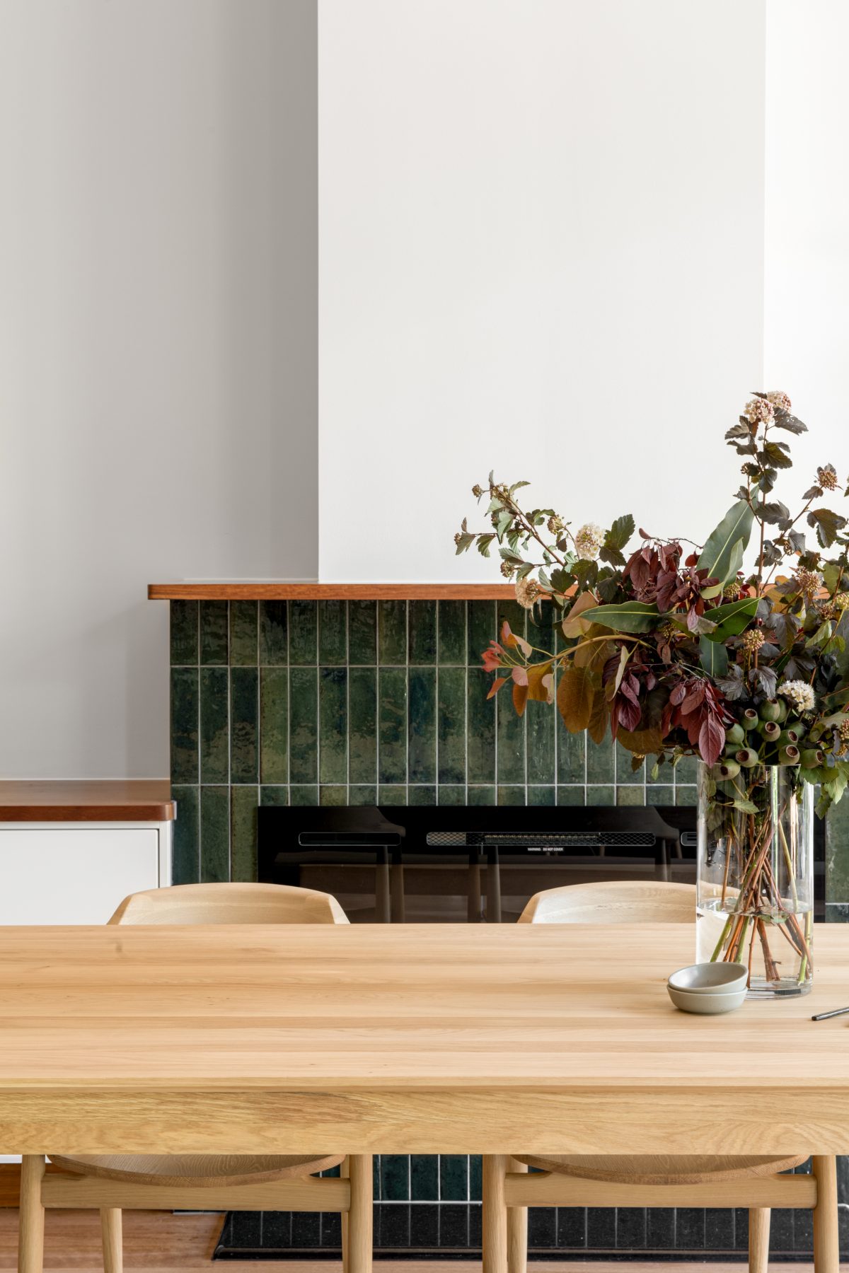 A custom designed living space featuring a fire place. Designed and built by MJ Harris Group. #MJHxEmpressRd