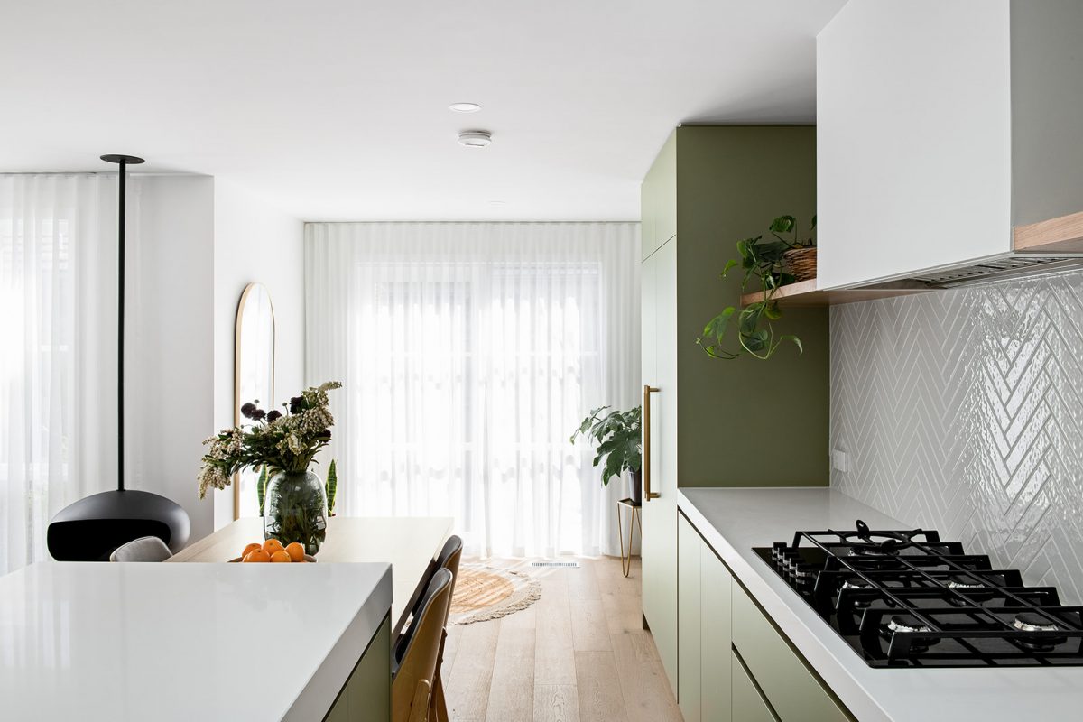A custom designed kitchen featuring green joinery. Designed and built by MJ Harris Group. #MJHxMardenSt